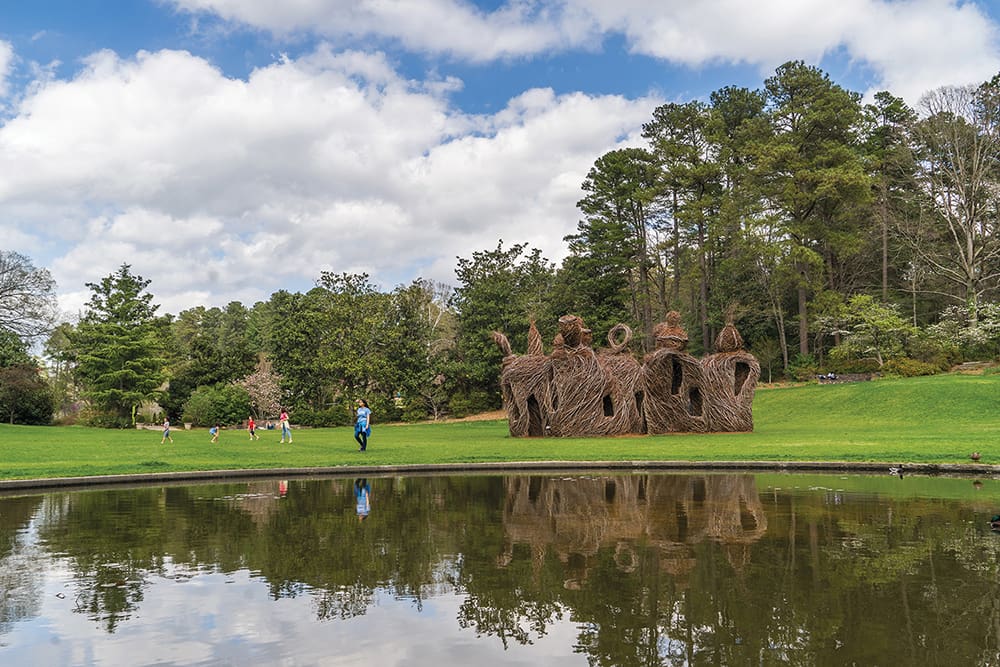 Patrick Dougherty sculpture in the gardens. Photo by Clarence Burke.