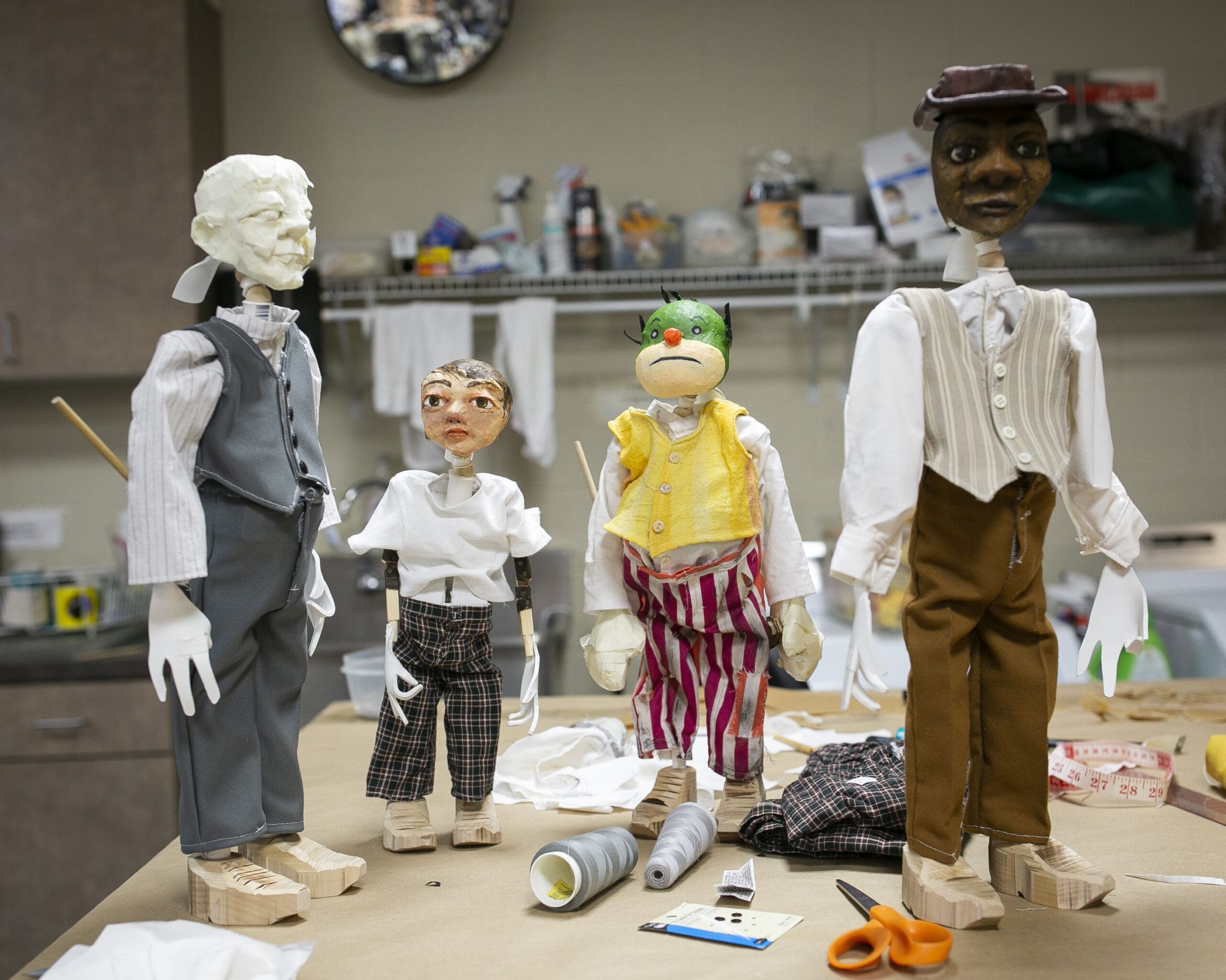 Four puppets in the workshop