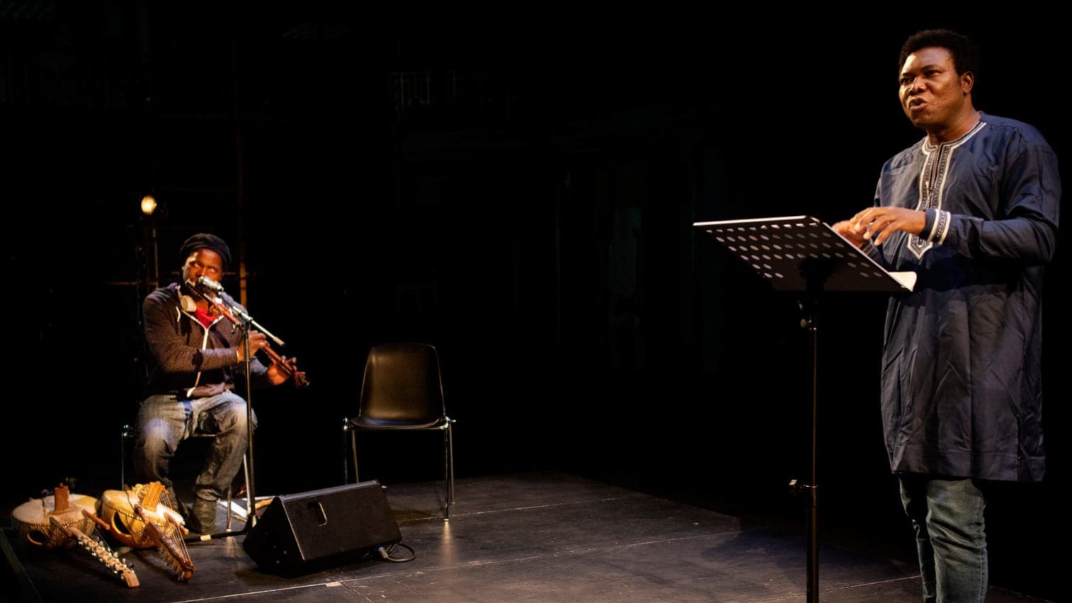 Felwine Sarr performing with violinist Gabriel Richard at a concert