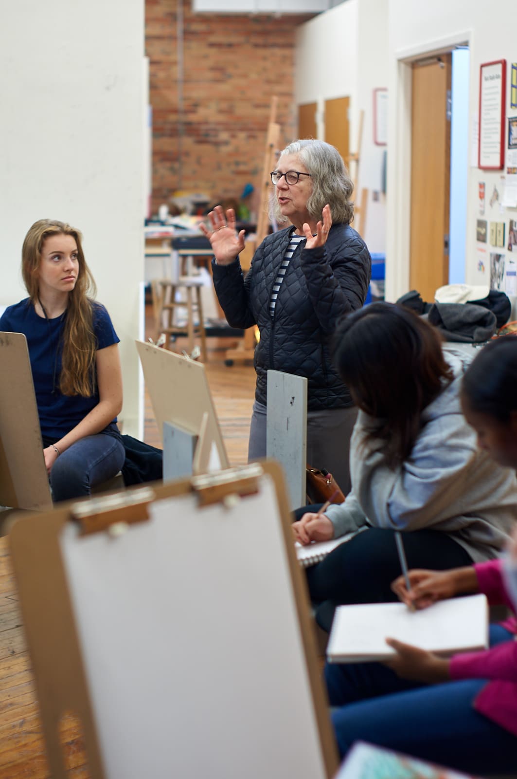 Maira Kalman speaking to the drawing class