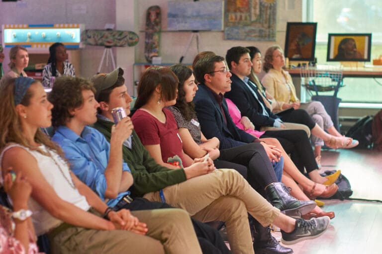 students sit in a row