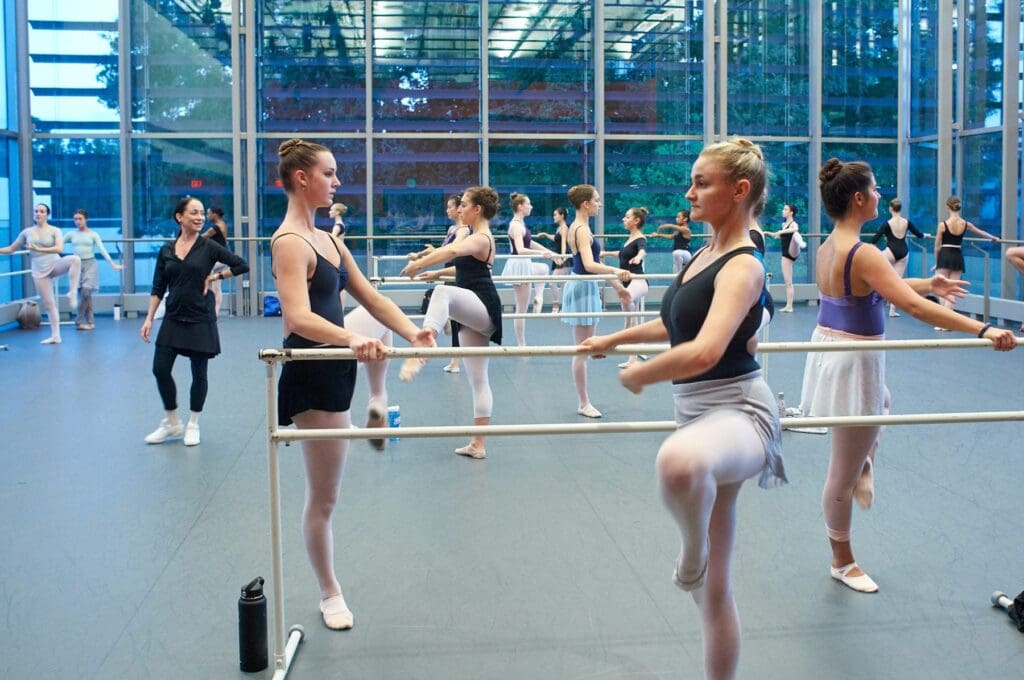 Student ballet dancers in class