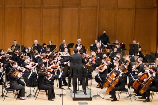 Harry Davidson conducting the DUSS Youth Symphony