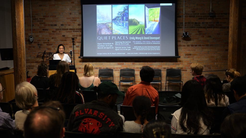 A young adult giving a presentation