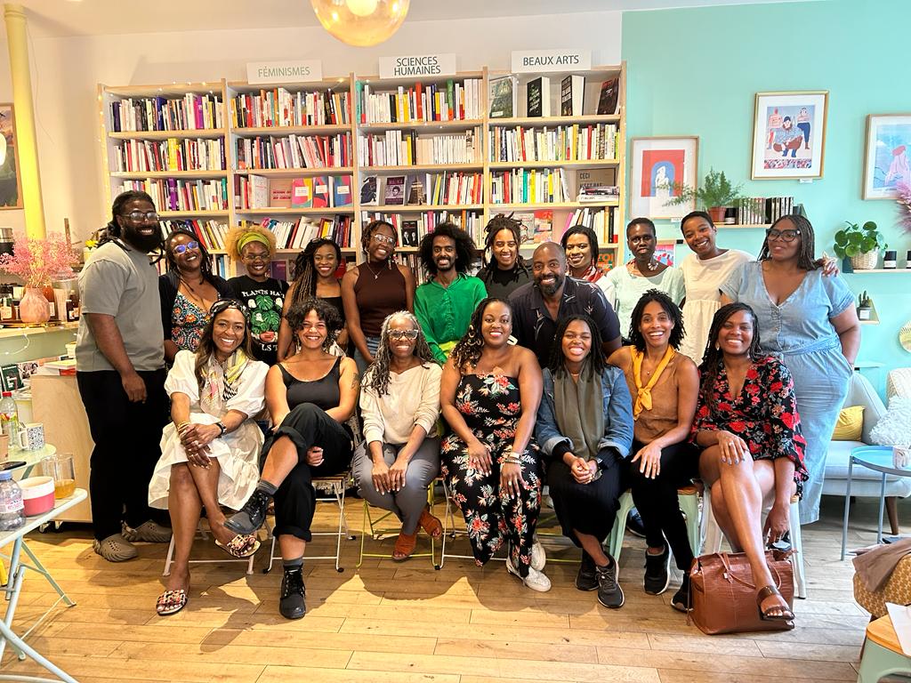 A big group of young adults in a library